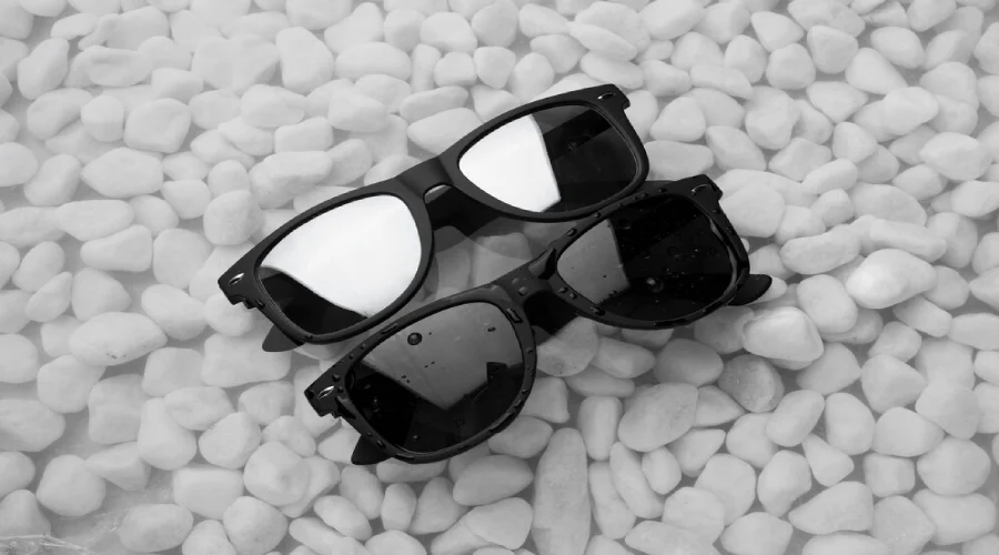 top-view-sunglasses-floating-water_23-2151013934
